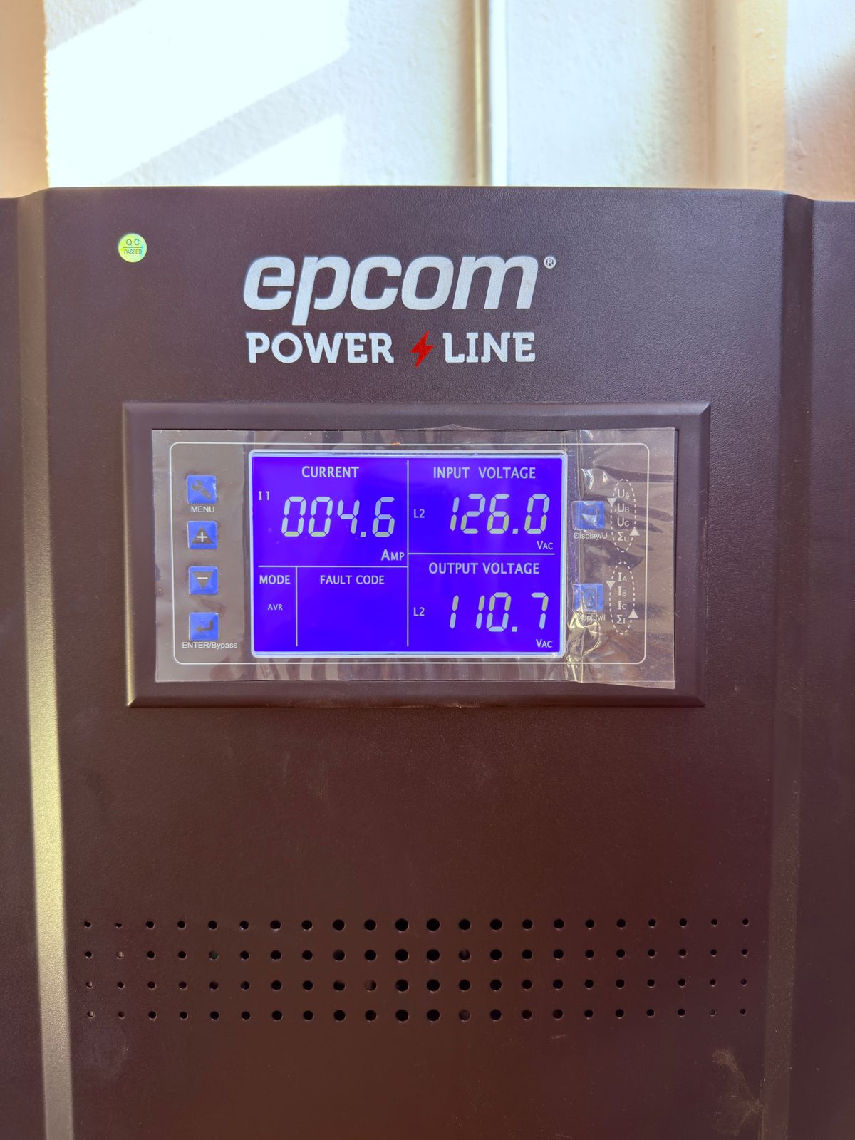 Voltage regulator showing 126V input and stabilized output around 110V